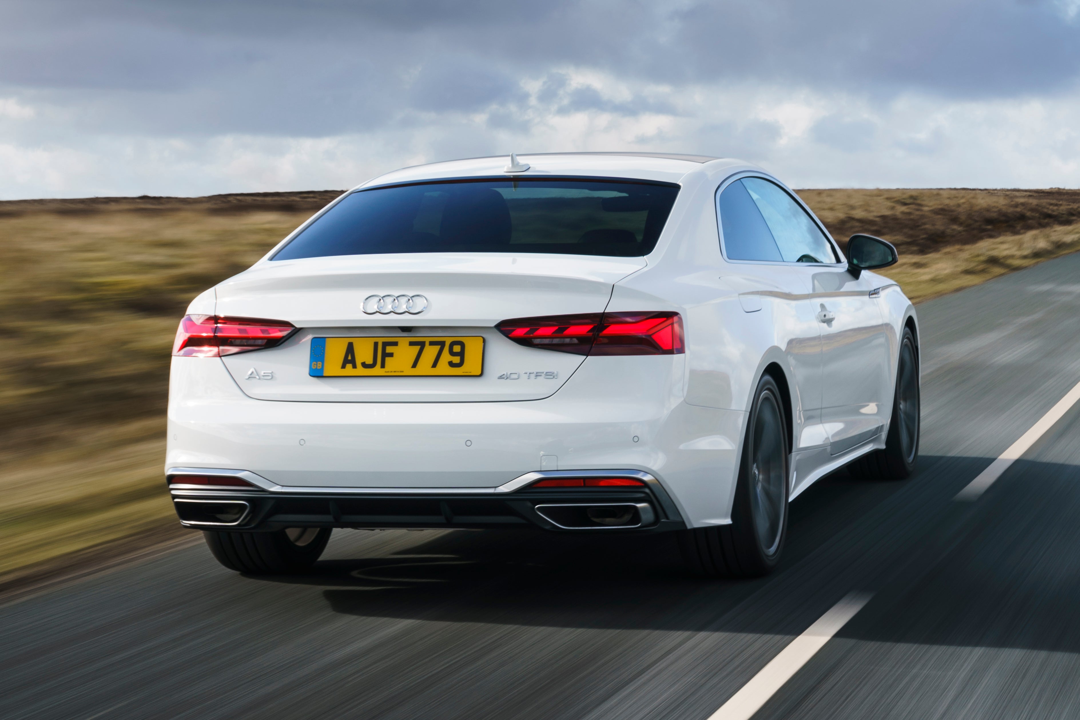 Audi A5 Review 2022: driving rear-three quarter 