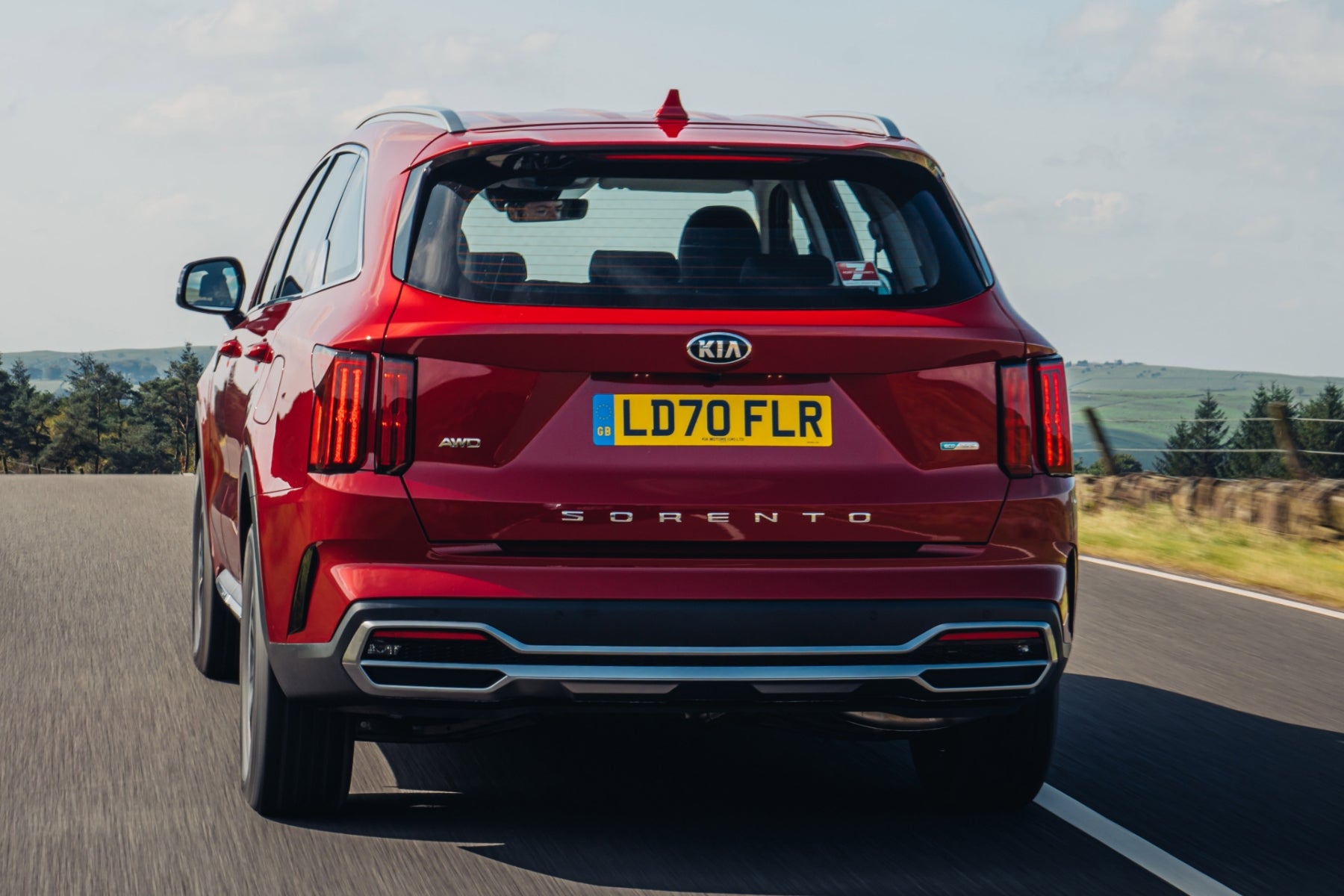 Kia Sorento driving rear