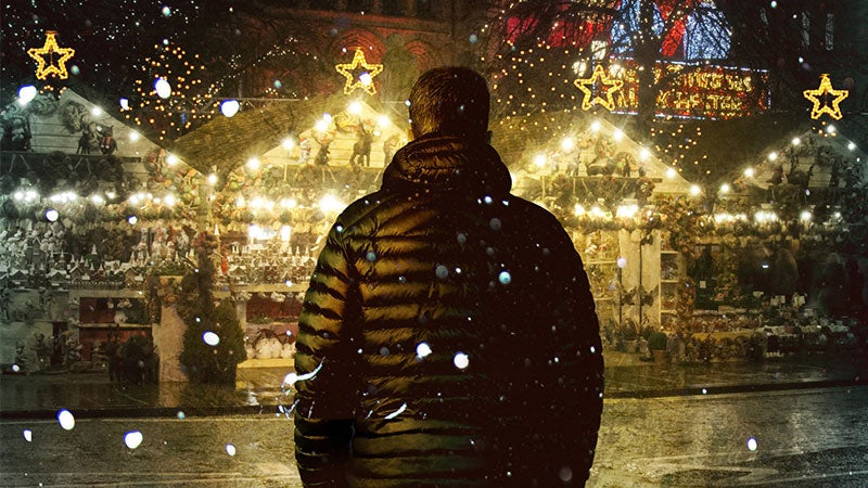Image is taken from the jacket of No Place like Home. A man ominously overlooks a row of houses covered in Christmas decorations.