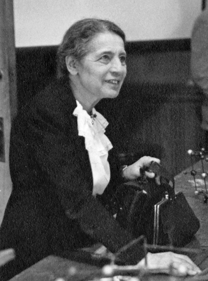 Black and white photograph of Lise Meitner lecturing at Catholic University in Washington D.C. in 1946