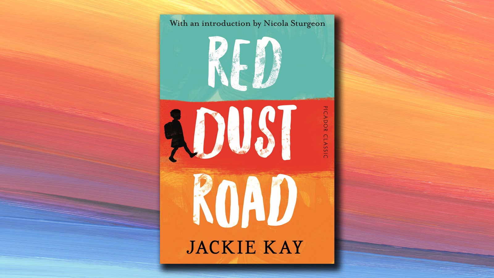 Red Dust Road jacket on a colourful background.