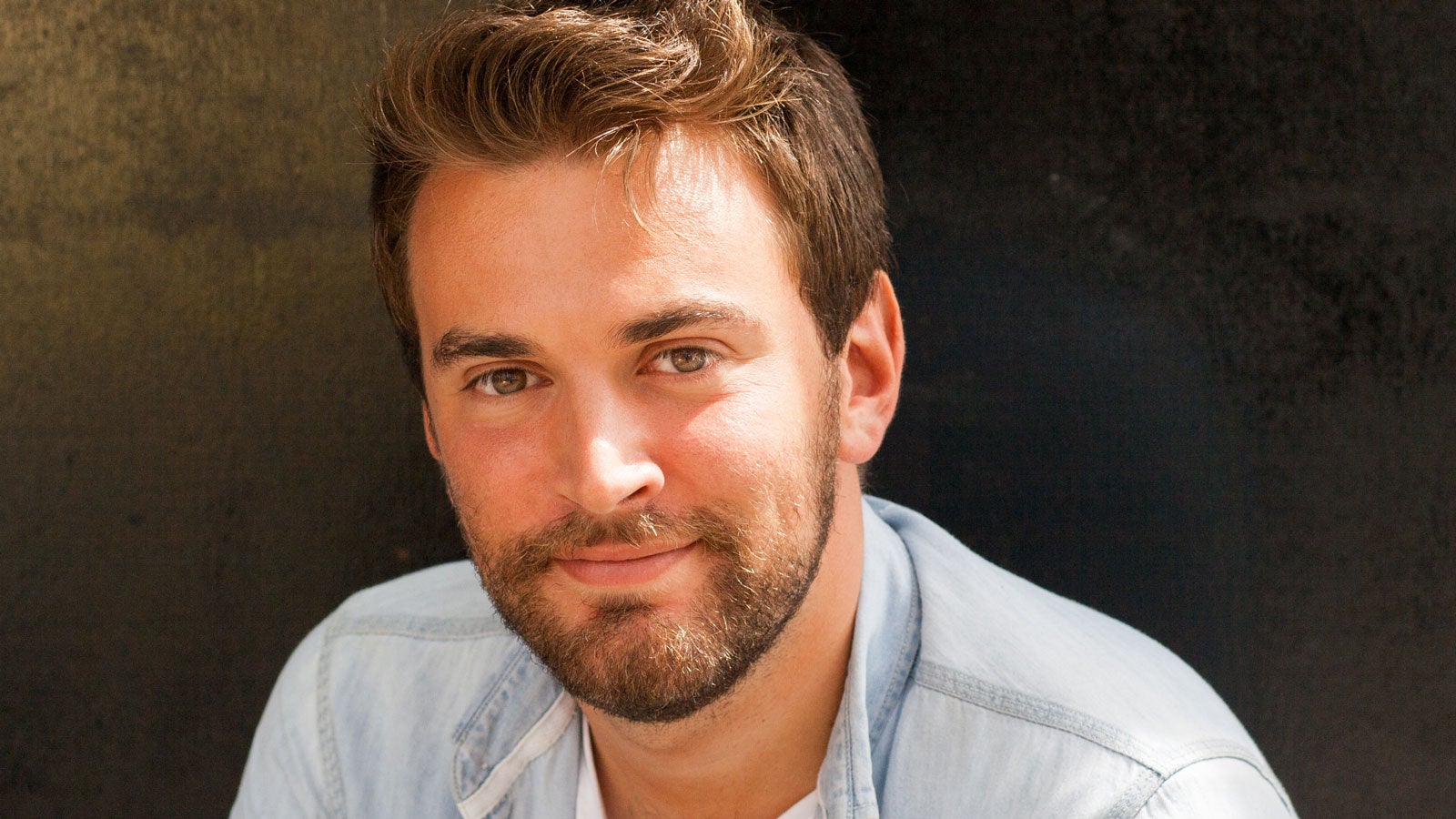 Jonny Benjamin smiles to the camera