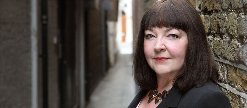 Author Jessie Keane in an alleyway
