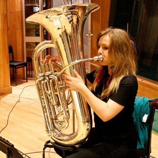 Woman playing the tuba