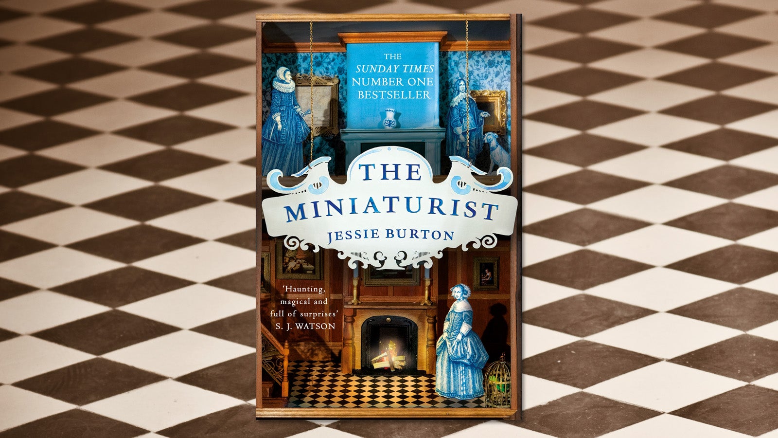 The book cover for The Miniaturist against a tiled floor background