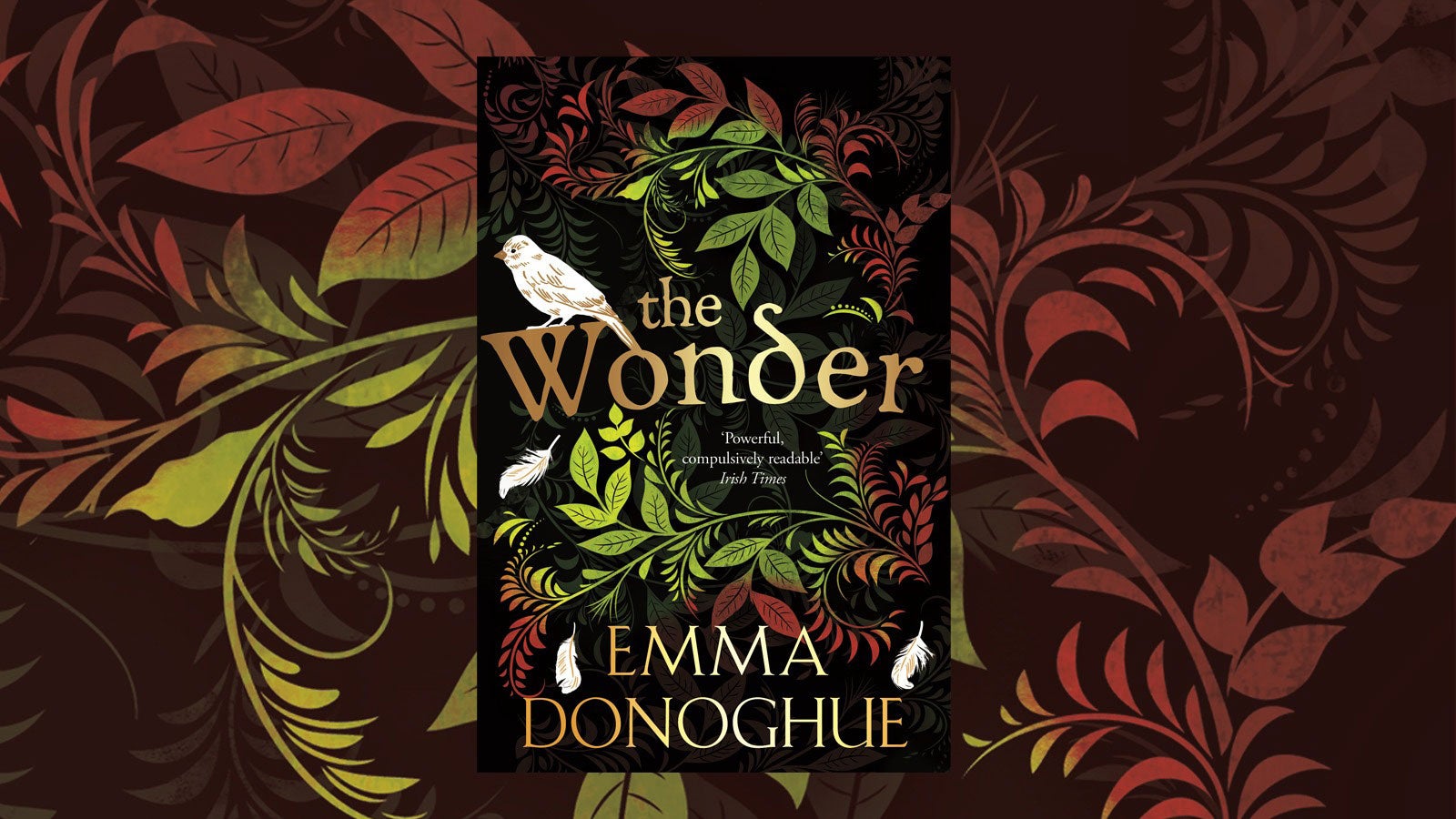 The Wonder by Emma Donoghue set against a backdrop of illustrated leaves.