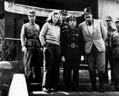 Martha Gellhorn and Ernest Hemingway with unidentified Chinese military officers, Chungking, China, 1941