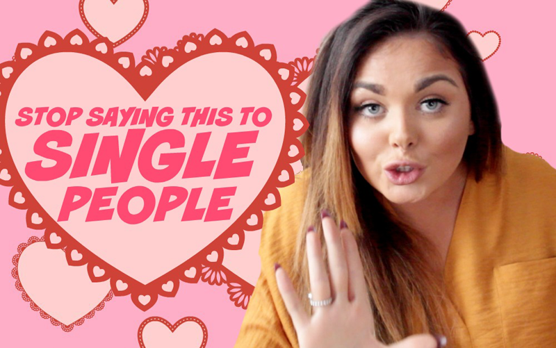 Scarlett Moffatt holding up her hand on a pink backdrop adorned with lacy love hearts and the words 'Stop saying this to single people'.
