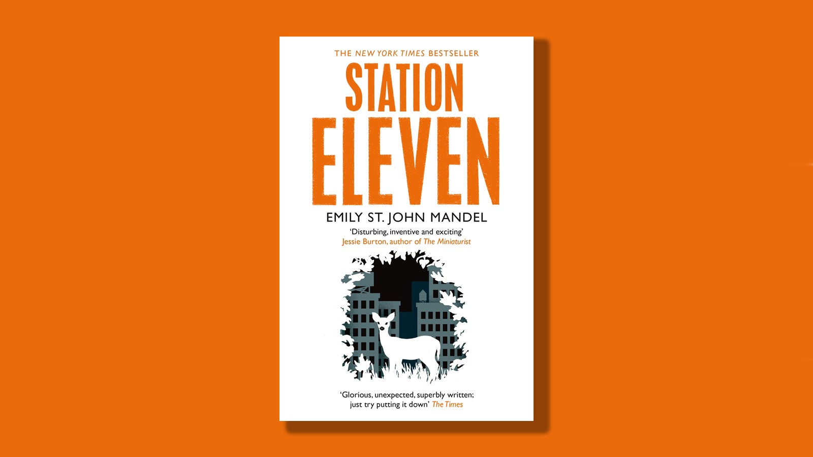 The Jacket cover for the book Station Eleven by Emily St. John Mander - with an illustration of a deer with city buildings in the background