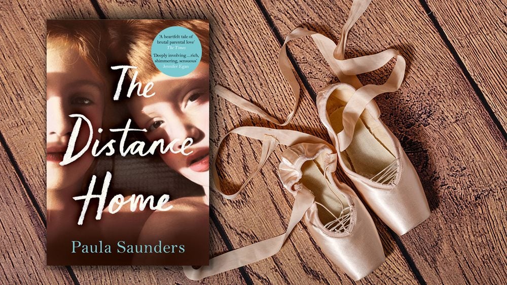 Book cover of The Distance Home next to a pair of ballet shows on a wooden floor