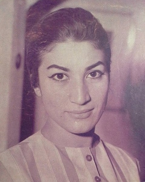 Black and white photograph of Forough Farrokhzad smiling
