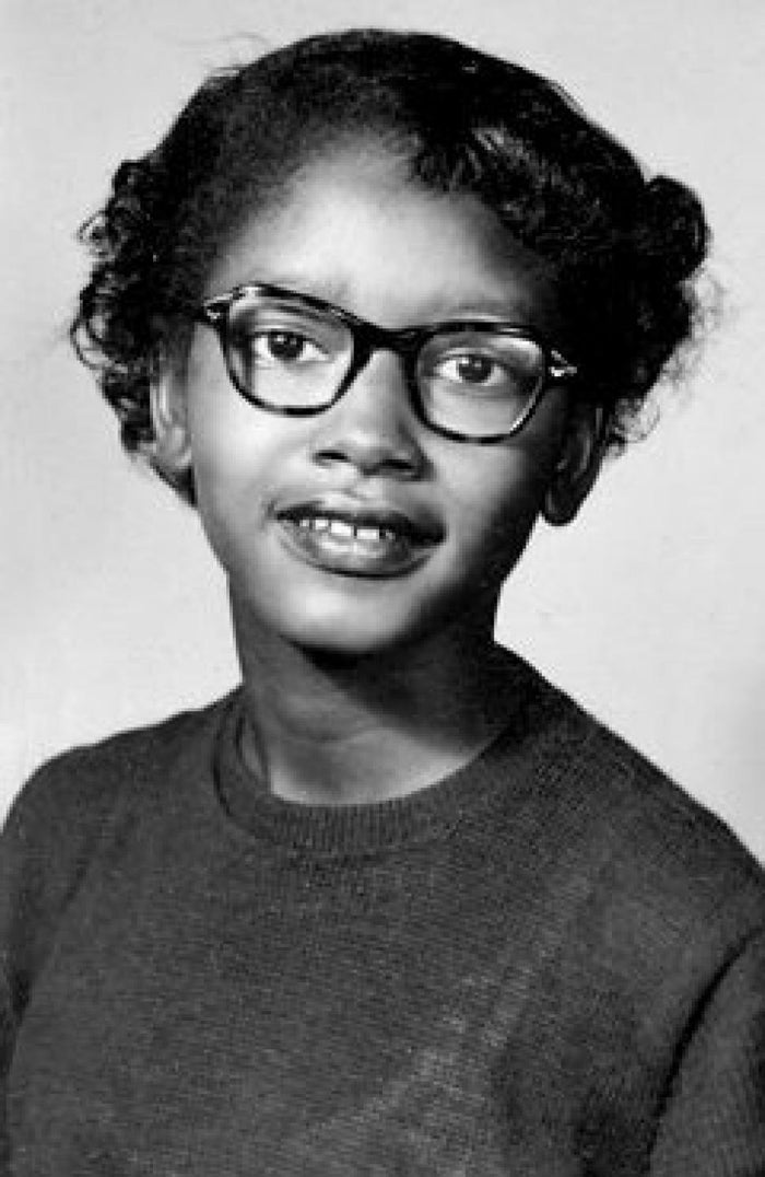 A black and white photograph of Claudette Colvin smiling