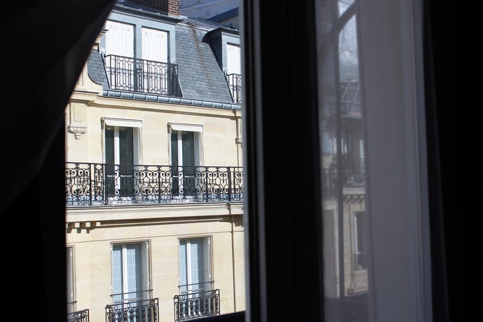 View of Paris out of an apartment window