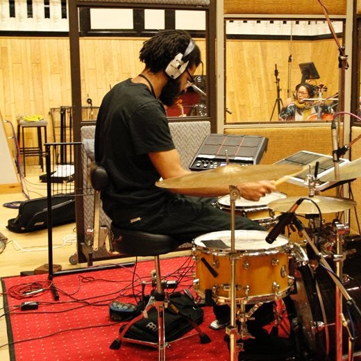 Drummer playing in the studio 