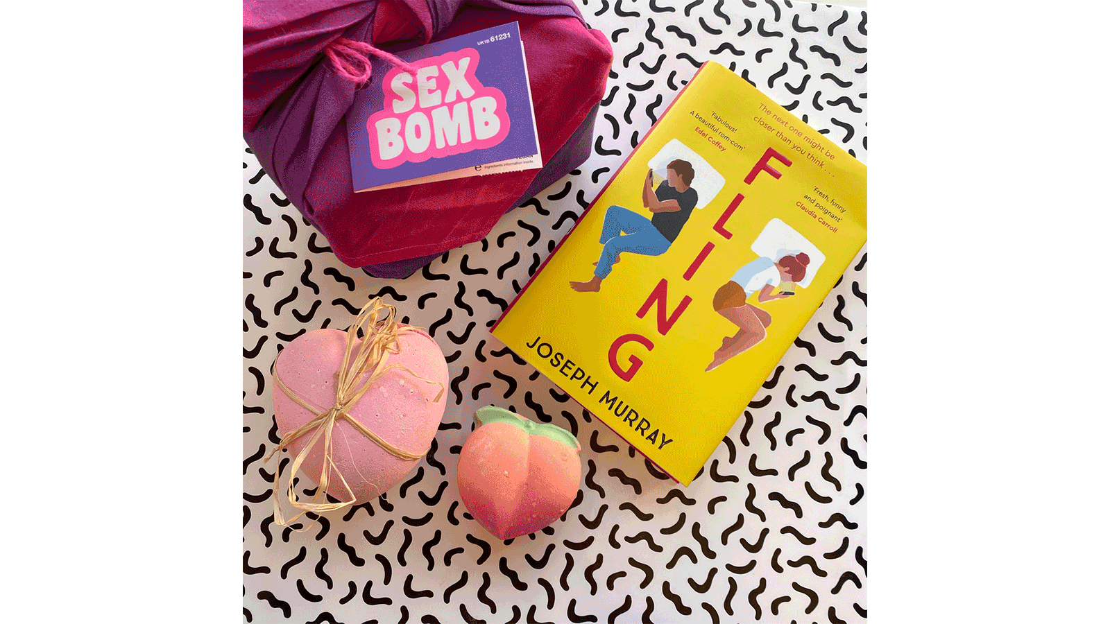 Fling hardback with some LUSH bath bombs