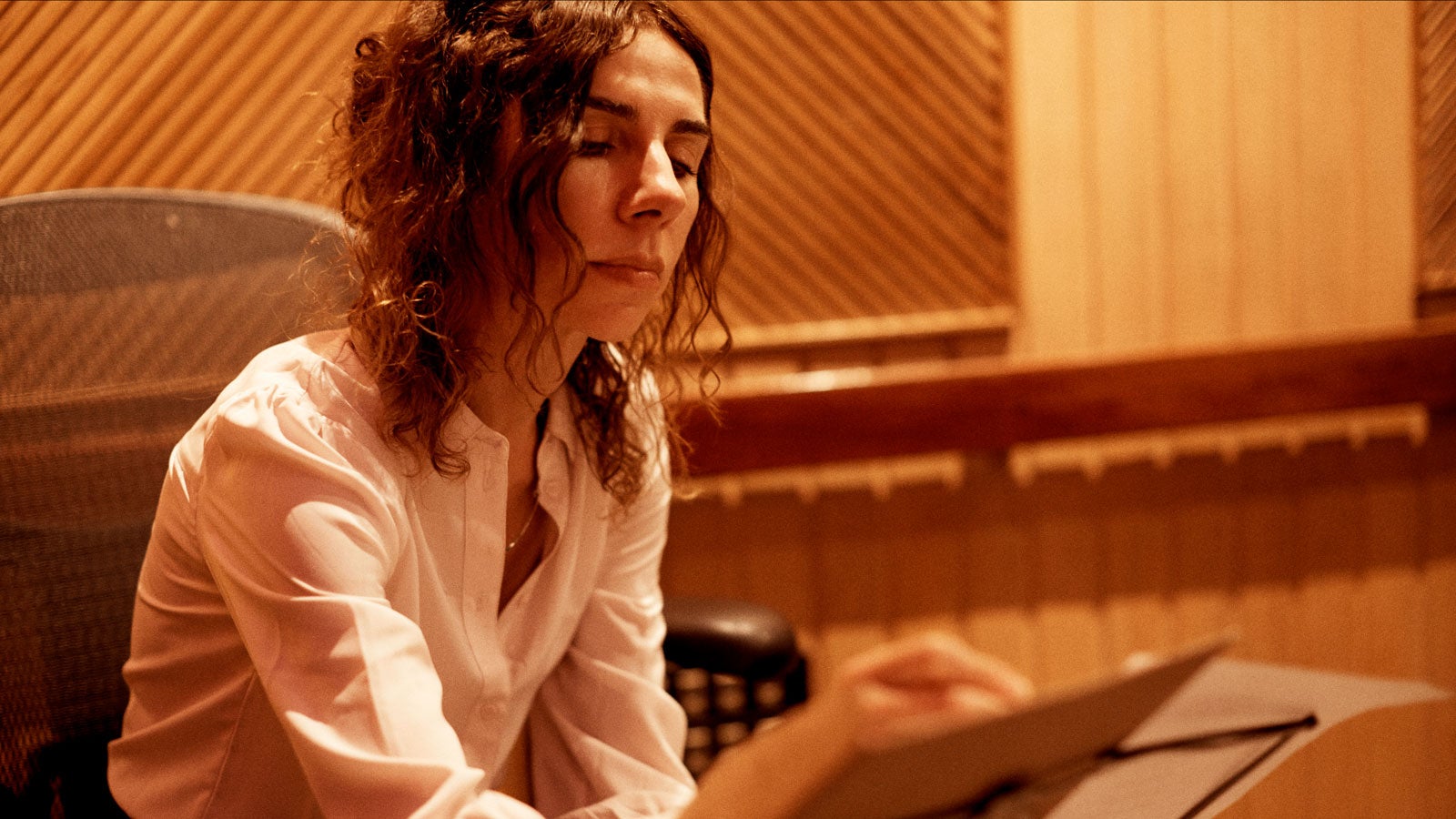 PJ Harvey writing in a studio