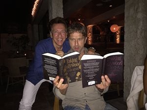 Gerard Butler reading Breaking Hollywood