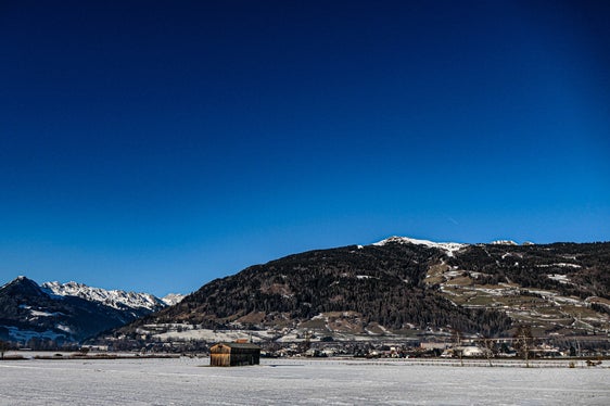 Bild des Monats Dezember 2024: Sterzing und die Berge von Ridnaun, festgehalten von Martin Geier