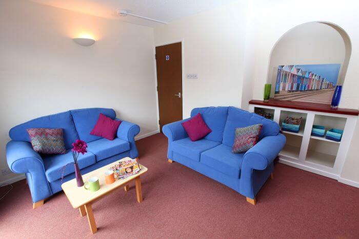 seating area with sofas and coffee table