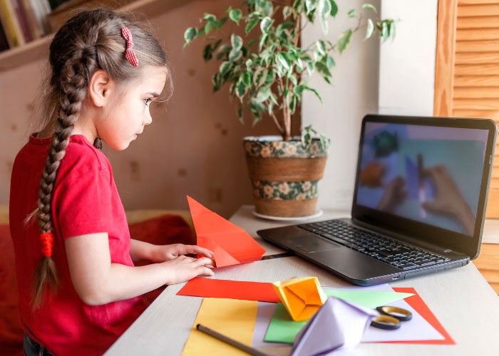 young girl on laptop