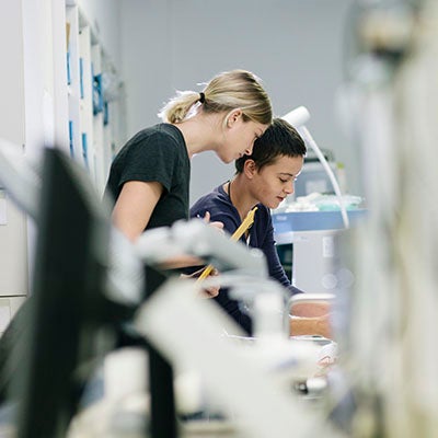 Two people working at a desk