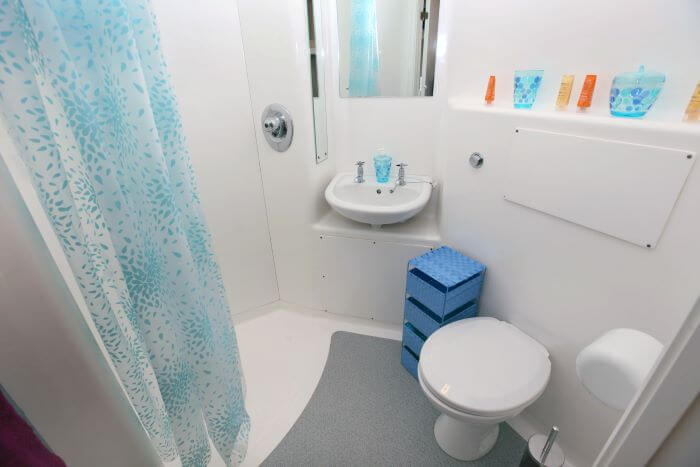 Wetroom with shower area, toilet and sink