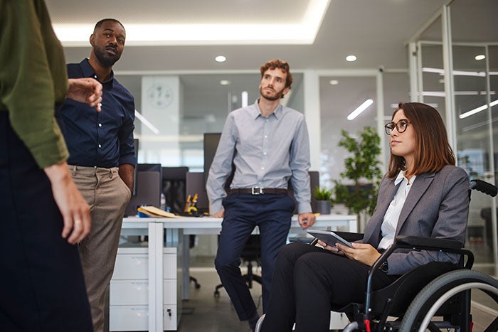 Diverse mix of colleagues in meeting