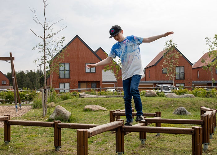 Young boy playing in a park