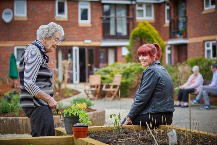 Two women in a community garden
