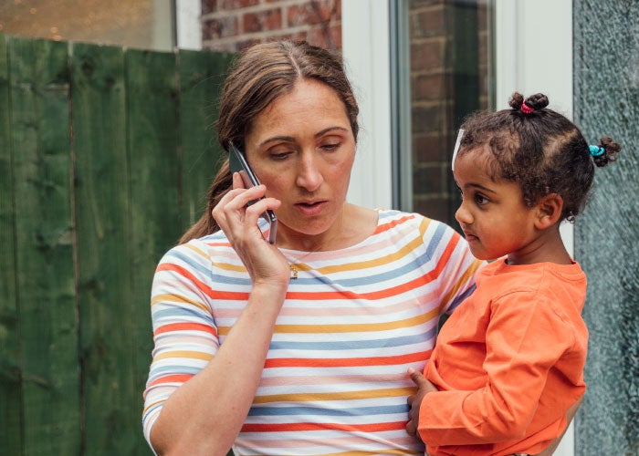 Anxious woman on phone