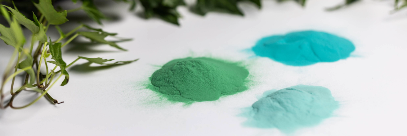 Envirocron Low Bake product card showing green plants and three shades of green powder against a white background