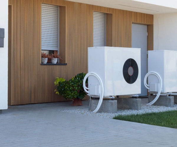 White HVAC system against exterior of building