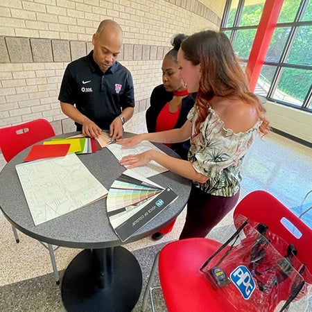 students viewing paint chips