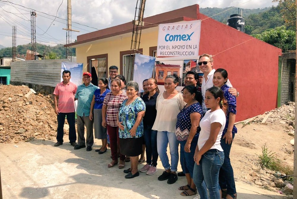 Group of volunteers ready to clean up post earthquake aftermath 