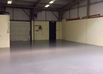 Large empty room inside a warehouse.