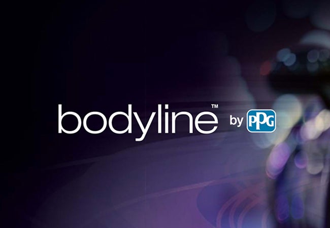 Bodyline logo over purple polished car