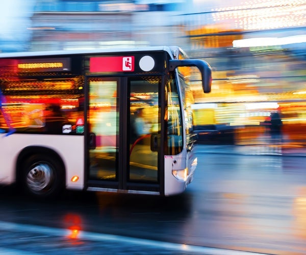 Fast moving blurred image of public transport