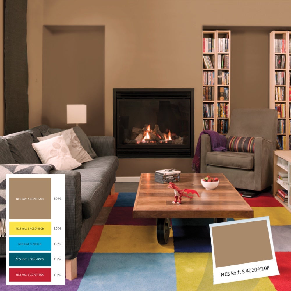 Obývací pokoj s krbem a pohovkou