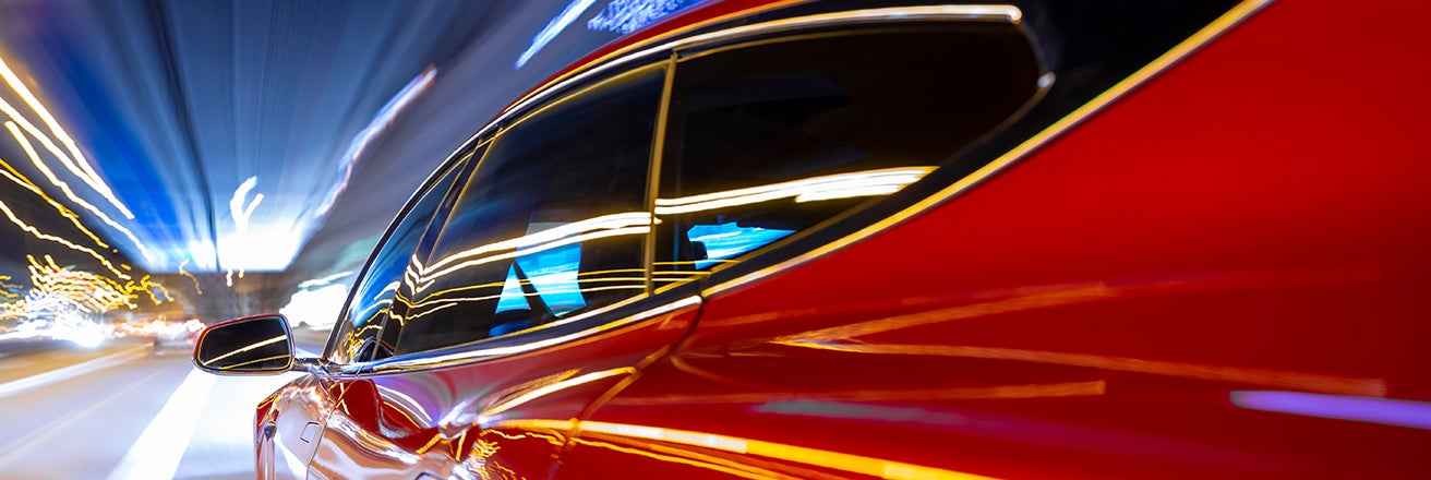Car coated with red PPG paint with high shine finish