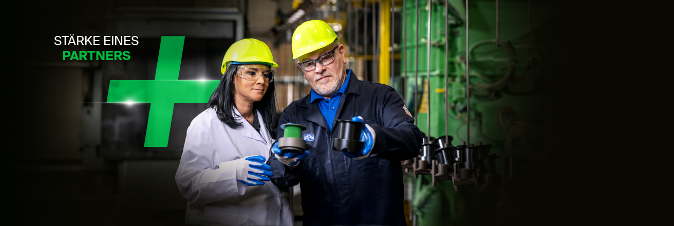Sustainability header banner showing a woman and a man in protective clothing and yellow hard hats with a green plus sign in the background - wording in German