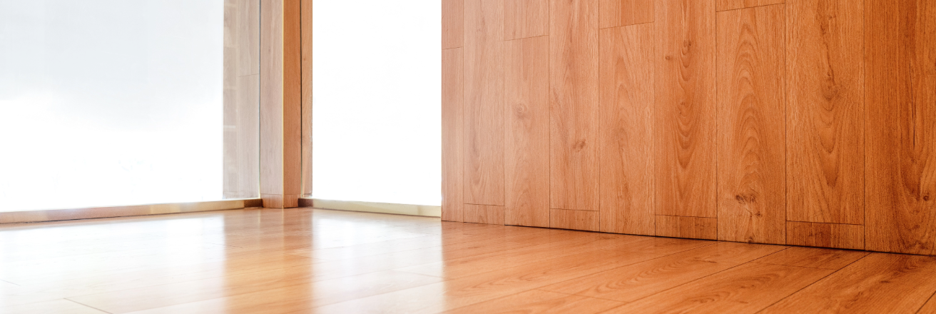 Light wood effect laminate panels for floor and wall coverage