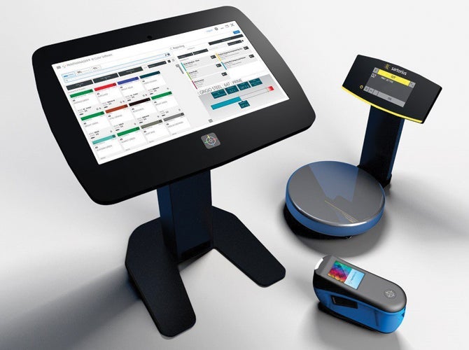 PaintManager XI device alongside screen and scales