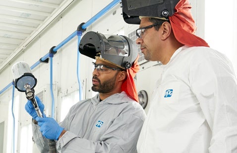 Training being carried out using spray guns