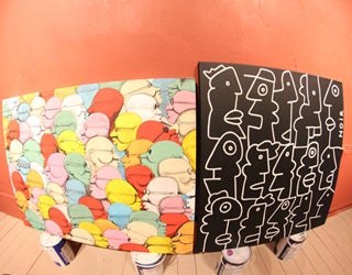 Two abstract head artworks, one black and white, the other vibrant and colorful.