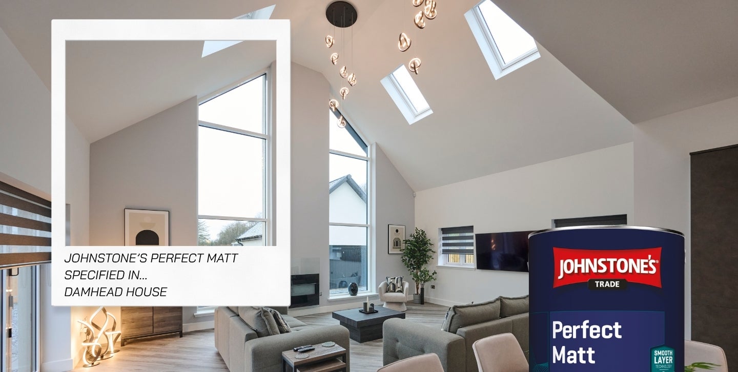 A room with a large ceiling and skylights