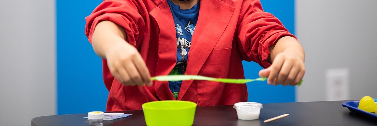 person conducting a chemistry experiment 