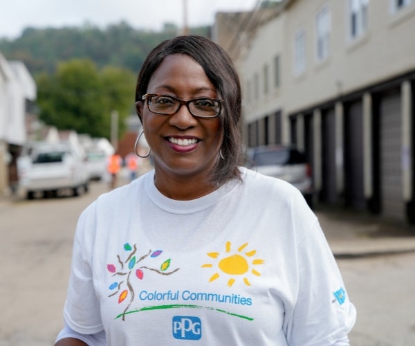 A woman smiling at camera