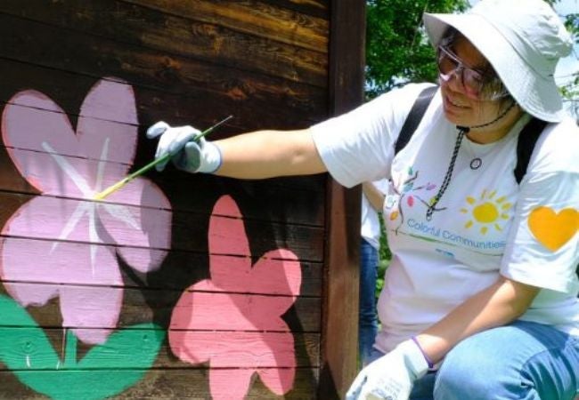 woman painting flower