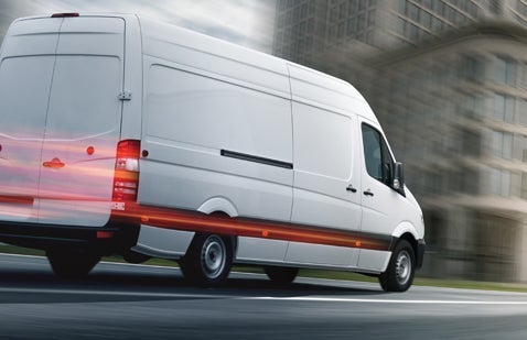 Large van travelling along road