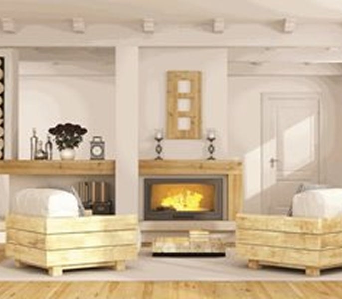 A living room with a fireplace and couches